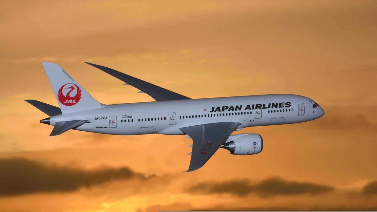 Japan Airlines flight Boeing 787 flying above the clouds